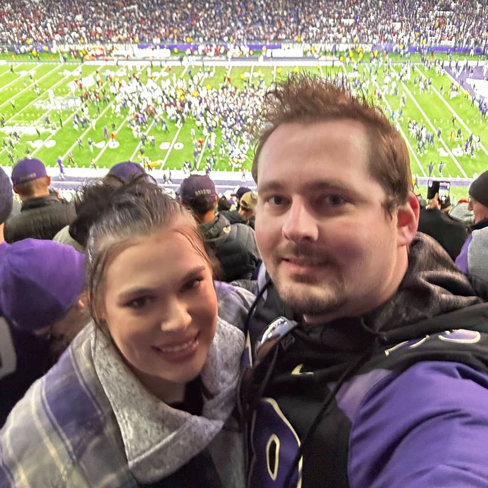 Britton and Kelly at a Husky game